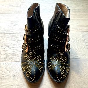 Black with gold buckle details boots